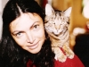 Sabina Levitzky (cousin of Natasha Utevsky) with her cat Monia. Leningrad, 197?, co RS