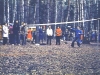 In those years, badminton was in vogue. The court was setup according to all the norms and requirements of the sport. Red ropes are lying as markers on the dried, winter leaves. Moscow, Ovrazhki forest, Lag baOmer, 1980. co RS