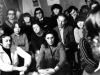 Apartment of Olga Serova and Evgeny Kozhevnikov. Spectators are watching their play “Refuseniks”. Moscow, end of 1978. co RS