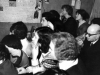 Apartment of Olga Serova and Evgeny Kozhevnikov. Spectators are watching their play “Refuseniks”. Moscow, end of 1978. co RS