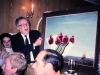 Leonid Stonov presenting a painting in the UCSJ meeting, Moscow, 1989, co Frank Brodsky