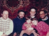 Meeting with American guests in Kosharovsky apartment: Victor Fulmakht, Zeev Shakhnovsky, guest, guest. Kids on the laps of guests are Moti and Eli Kosharovsky. Moscow 1984.
