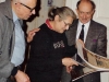 At the home of Andrei Sakharov and Elena Bonner. Isi Leibler presents  them with an illuminated Jewish Art Calendar. Moscow, 1987. co RS