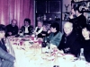 1987. At Evgenya and Michael Kalendarev's  apartment not long before Taratutas departure to Israel. Sitting around the table, from the left: Vera Sheiba, Aba and Ida Taratuta, Faina Taratuta (mother of Aba), Jerry Rudman, Gail Shapiro, Frank and Bunny Brodsky. Standing with a camera – Edward Markov. Leningrad, December 1987. co RS